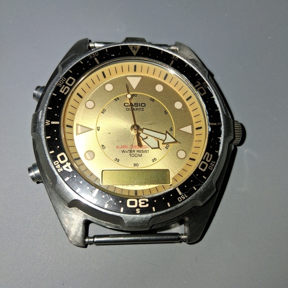 Casio Gold Dial Black Bezel Watch
